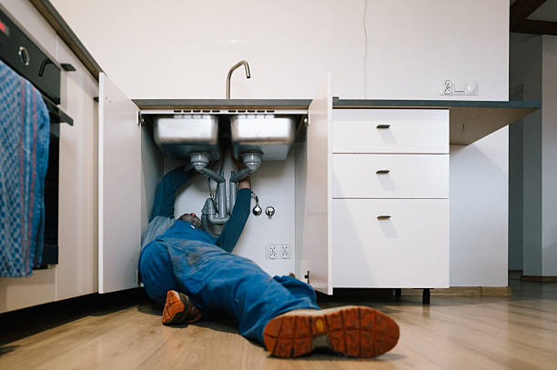Professional Emergency Plumber technician working in Plainview, MN